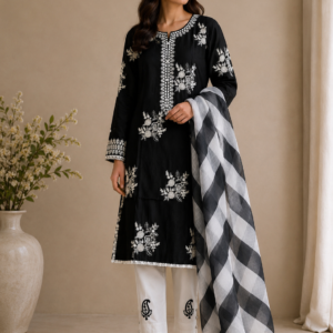 Black embroidered ensemble with a striking monochrome dupatta